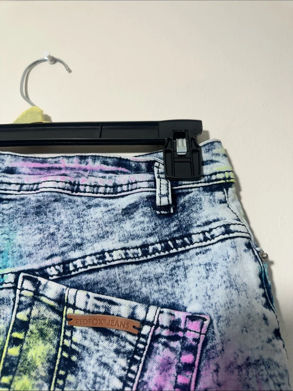 High-Rise Acid-Wash Denim Cutoff Shorts in Multicolor Splatter